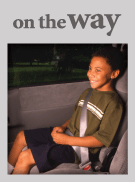 Child using seat belt correctly